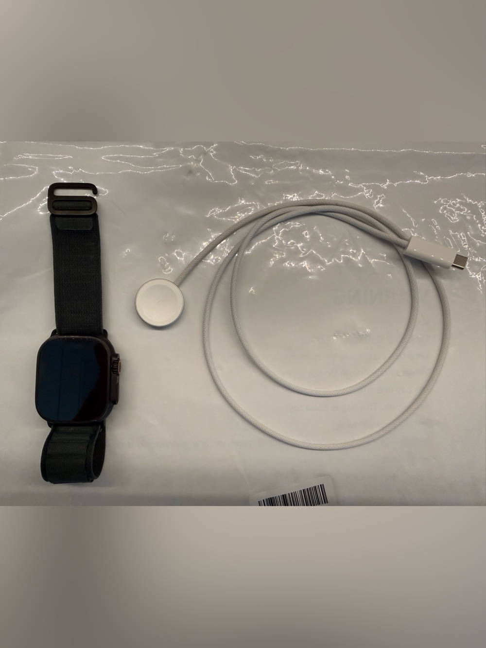 Apple Watch Ultra 2 49mm with olive green wrist band
